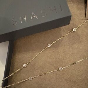 Shashi Chelsea gold lariat necklace